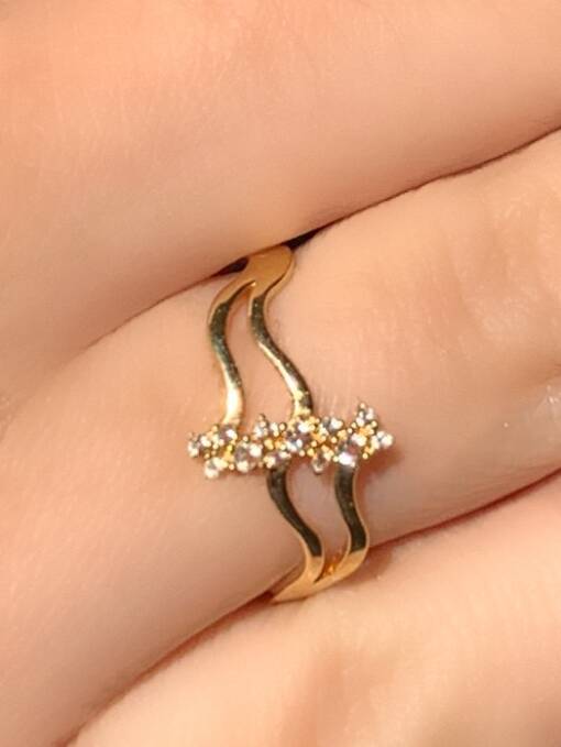 anel-em-ouro-18k-com-flores-em-topazio-branco